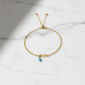 Pulsera Dorada con Piedra Celeste - mármol