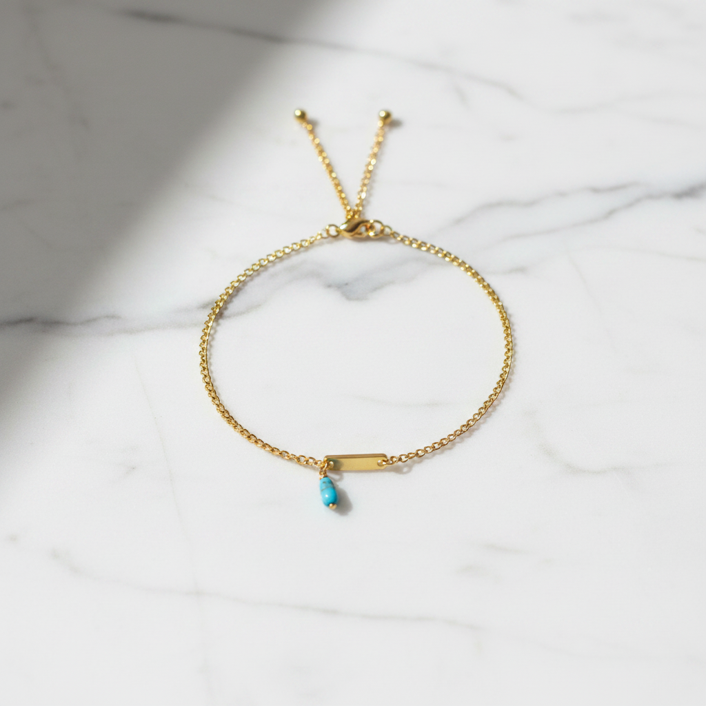 Pulsera Dorada con Piedra Celeste - mármol
